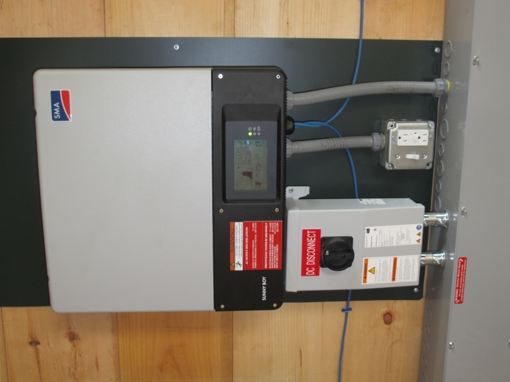 A dedicated outlet is mounted below the inverter, providing up to 1,500 watts of power when the grid is down. Photo Credit: GreenBuildingAdvisor.com