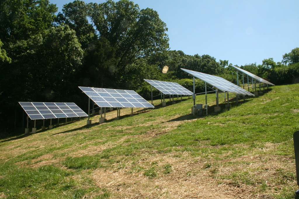 Separate, smaller arrays make the hillside manageable for the 120 kW system.