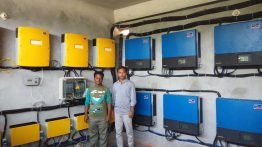 Inverter and Control room of ShouroBangla mini-grid project. In Photo: me and Devdas (site engineer of mini-grid)