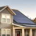 Solar photovoltaic panels on a house roof. Solar photovoltaic panels on a house roof for providing sustainable alternative energy from natural resources